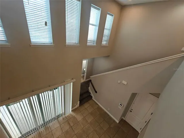 a hallway with a large window