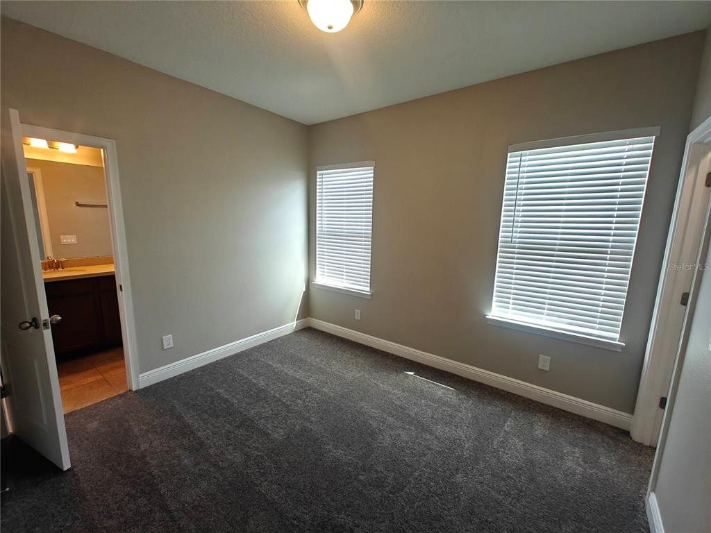 8075 Schelling Street Orlando, FL 32827 - Photo 31 of 51 an empty room with a window