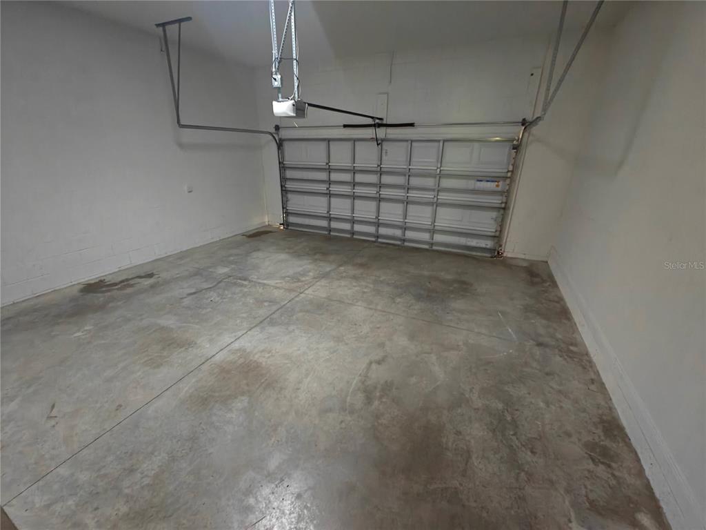 8075 Schelling Street Orlando, FL 32827 - Photo 44 of 51 a view of a garage