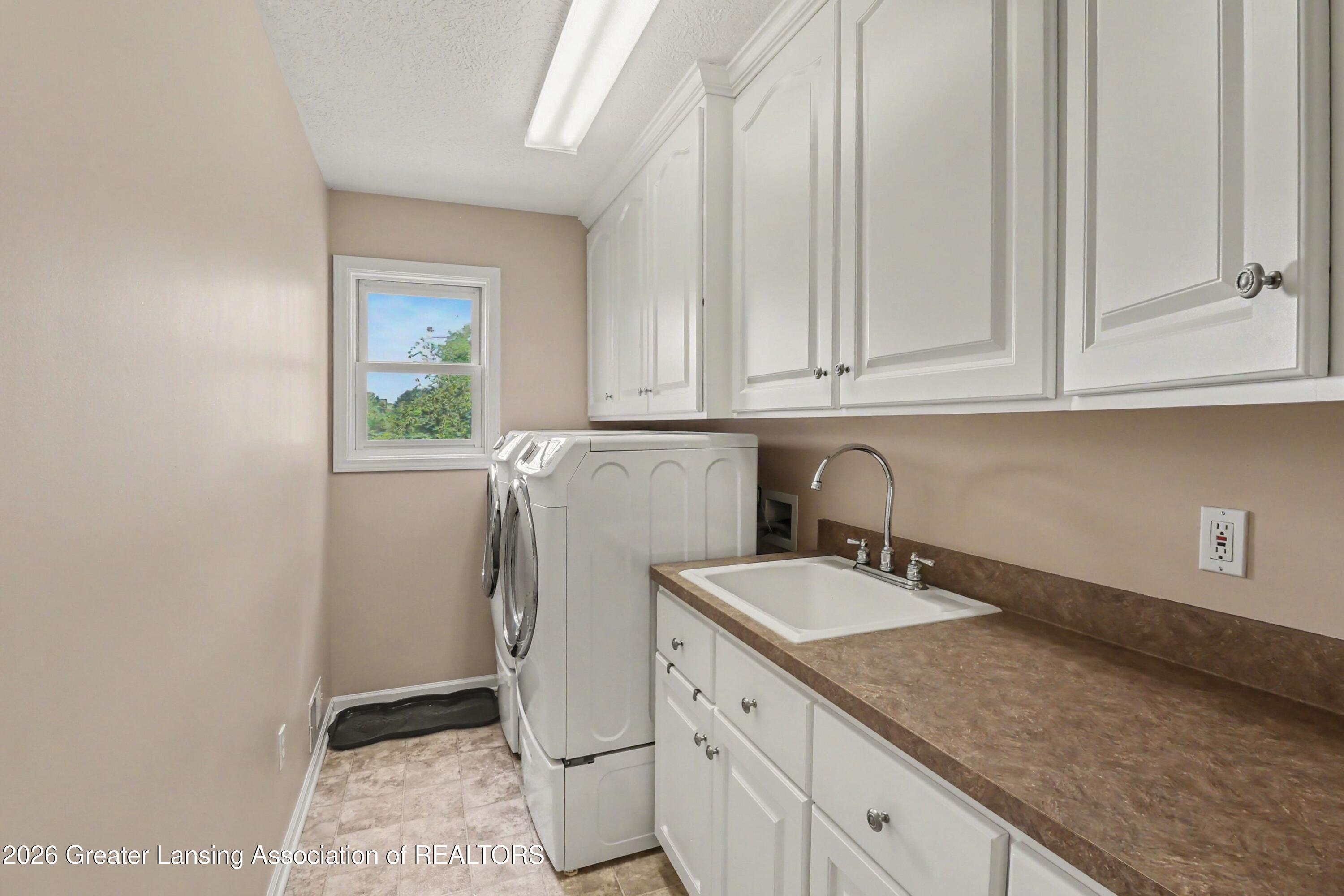 2626 South Edgar Road Mason, MI 48854 - Photo 12 of 28 1st Floor Laundry