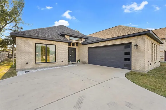 a view of a house with a garage