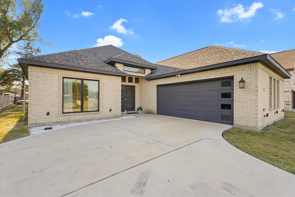 a view of a house with a garage