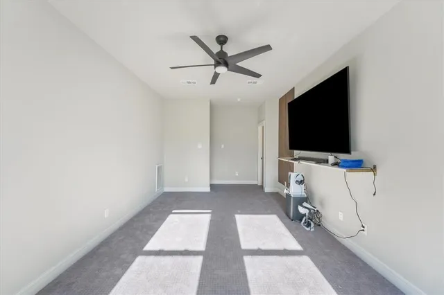 a view of a livingroom with a flat screen tv