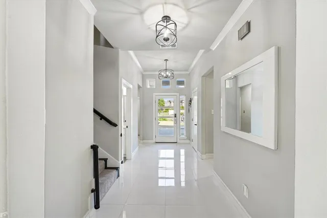 a view of entryway with chandelier