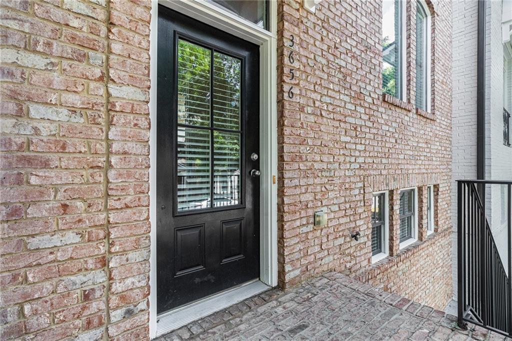 3656 Chicago Street Northwest Suwanee, GA 30024 - Photo 3 of 26 a bathroom with a window