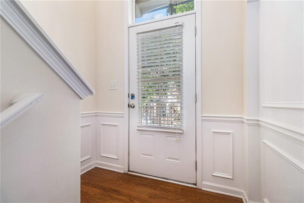 3656 Chicago Street Northwest Suwanee, GA 30024 - Photo 4 of 26 a view of an entryway with wooden floor