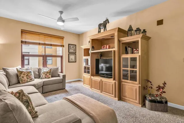 a bedroom with a bed furniture and a window
