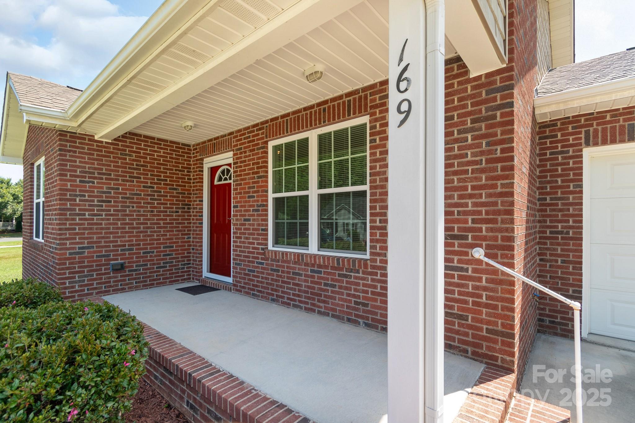 169 Abigail Lane Locust, NC 28097 - Photo 3 of 18 a view of front door of house