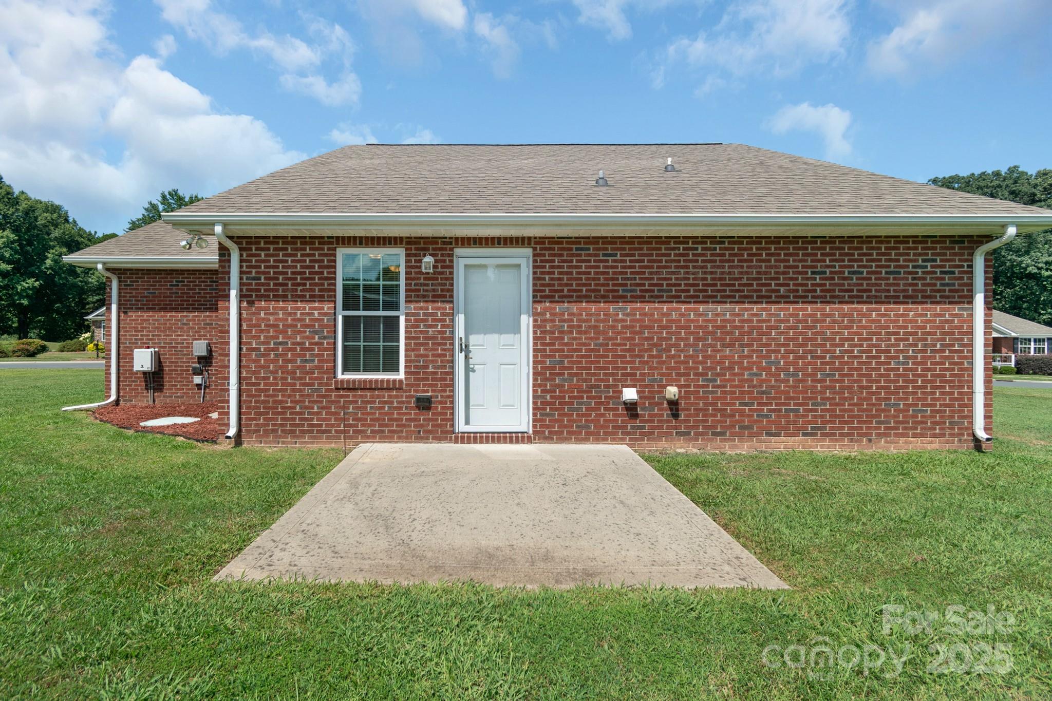 169 Abigail Lane Locust, NC 28097 - Photo 6 of 18 a front view of a house with a yard