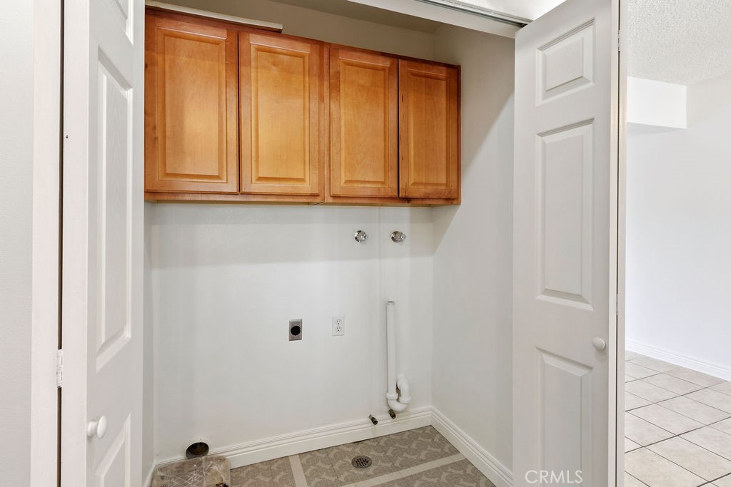 1801 Greenleaf Street, Unit 15 Santa Ana, CA 92706 - Photo 15 of 26 a bathroom with a sink