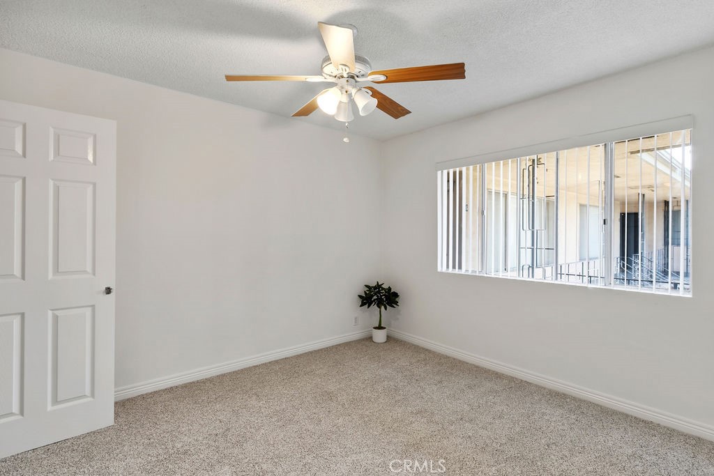 1801 Greenleaf Street, Unit 15 Santa Ana, CA 92706 - Photo 19 of 26 a view of an empty room with a window