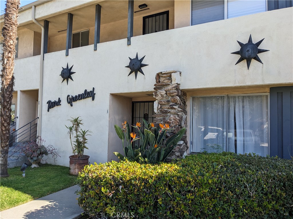 1801 Greenleaf Street, Unit 15 Santa Ana, CA 92706 - Photo 4 of 26 a view of a house with a backyard