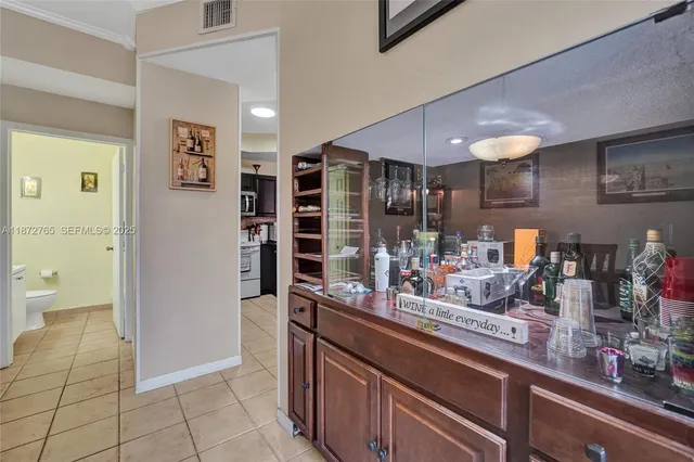 a bathroom with a sink and mirror