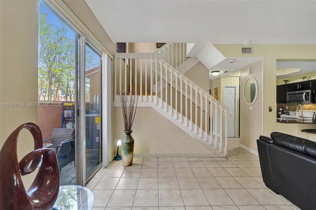 a bathroom with a mirror and a sink