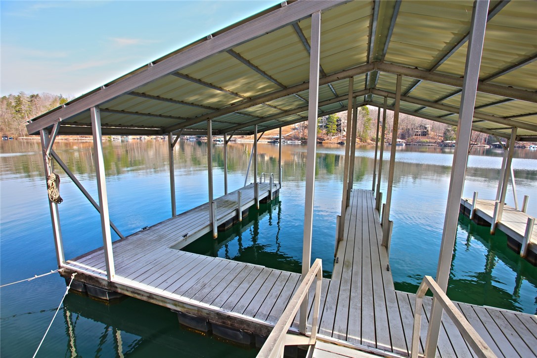 Lot 5 Royal Reserve Sunset, SC 29685 - Photo 15 of 50 Boathouse with a dock offers convenient access to the tranquil lake.