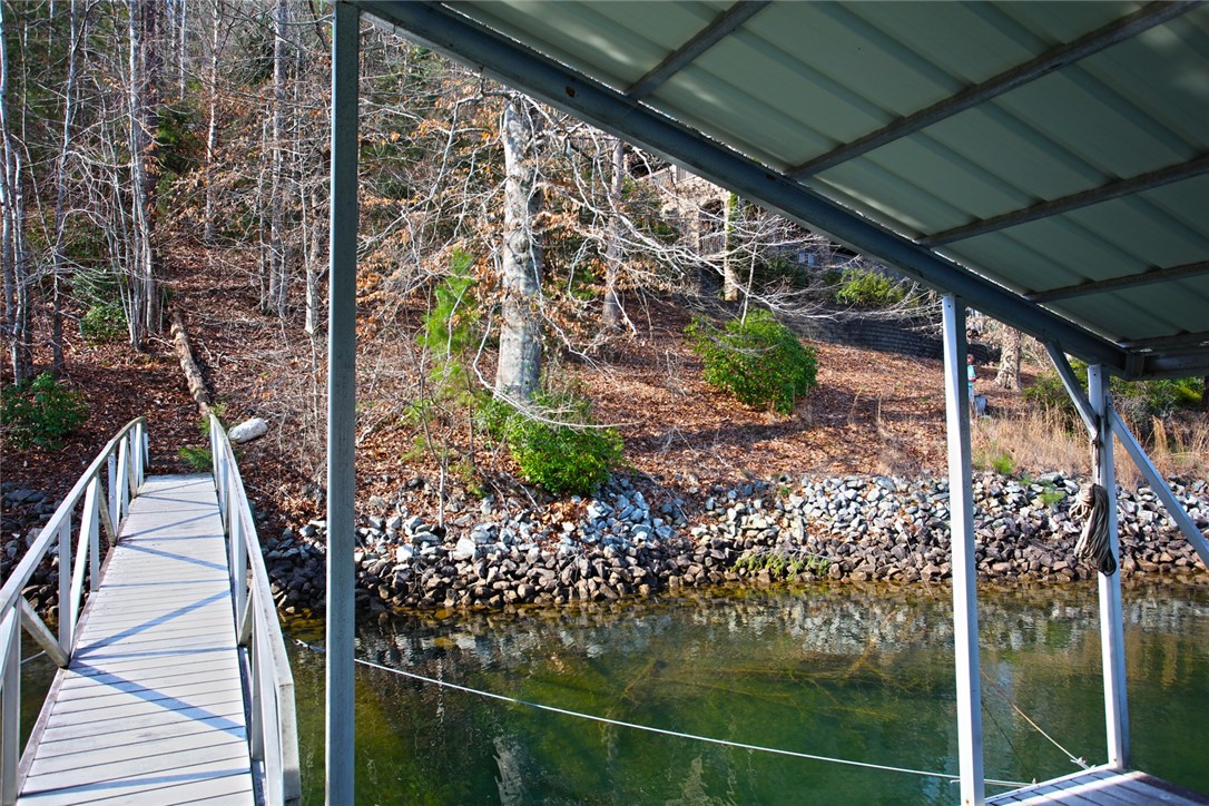 Lot 5 Royal Reserve Sunset, SC 29685 - Photo 21 of 50 This serene waterfront property offers a private dock with direct lake access.