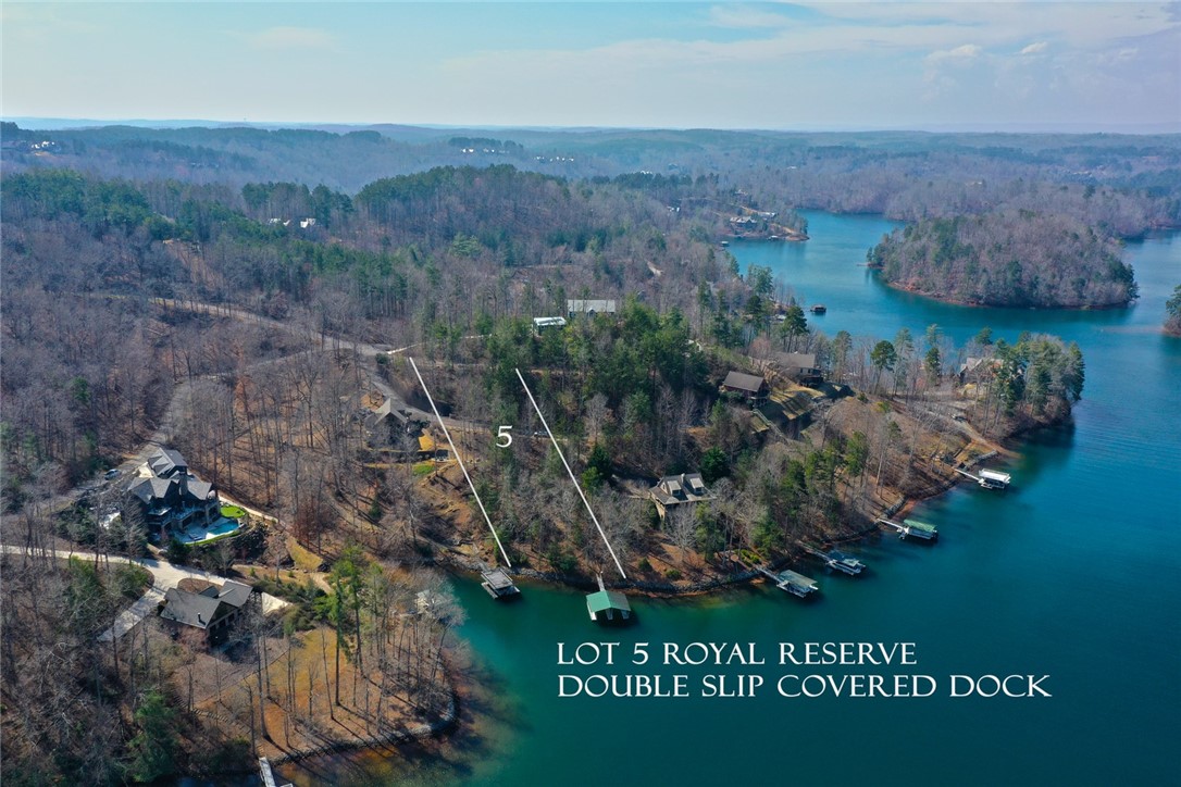 Lot 5 Royal Reserve Sunset, SC 29685 - Photo 4 of 50 This scenic lakefront lot offers direct access to the water with a private double slip covered dock.