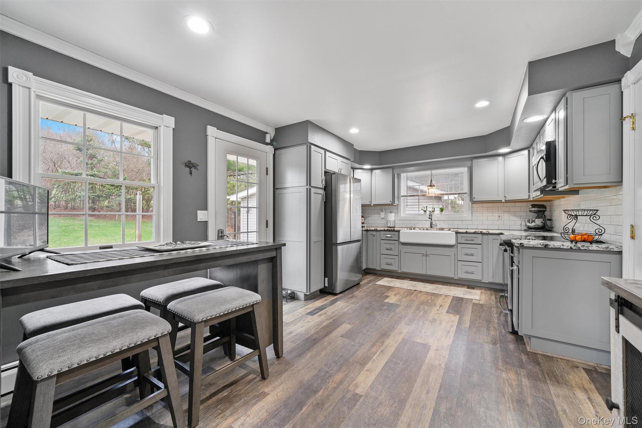 5 Hess Road Callicoon, NY 12723 - Photo 15 of 45 a kitchen with a table chairs refrigerator and window