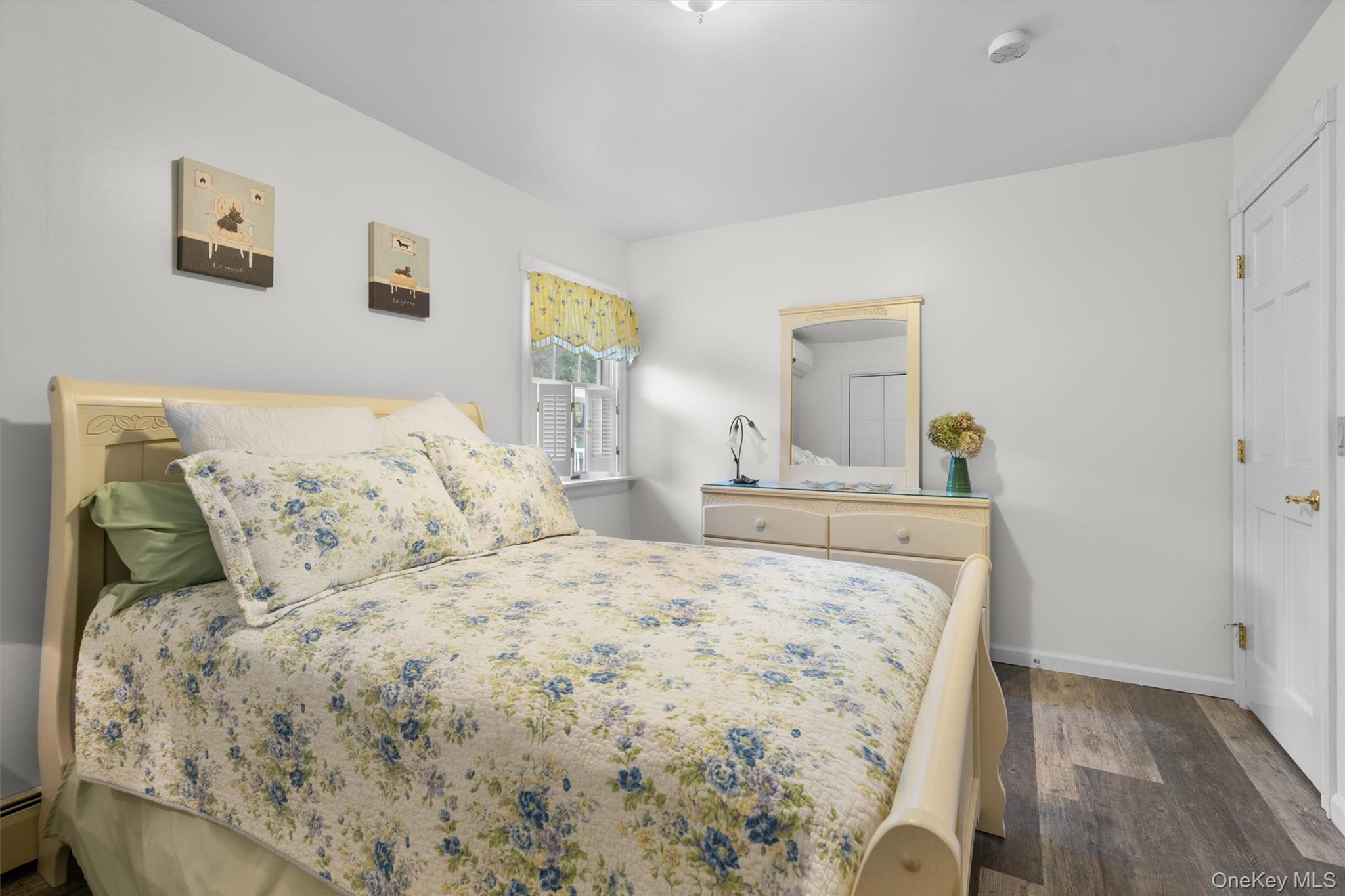 5 Hess Road Callicoon, NY 12723 - Photo 17 of 45 a bedroom with a bed and painting on the wall