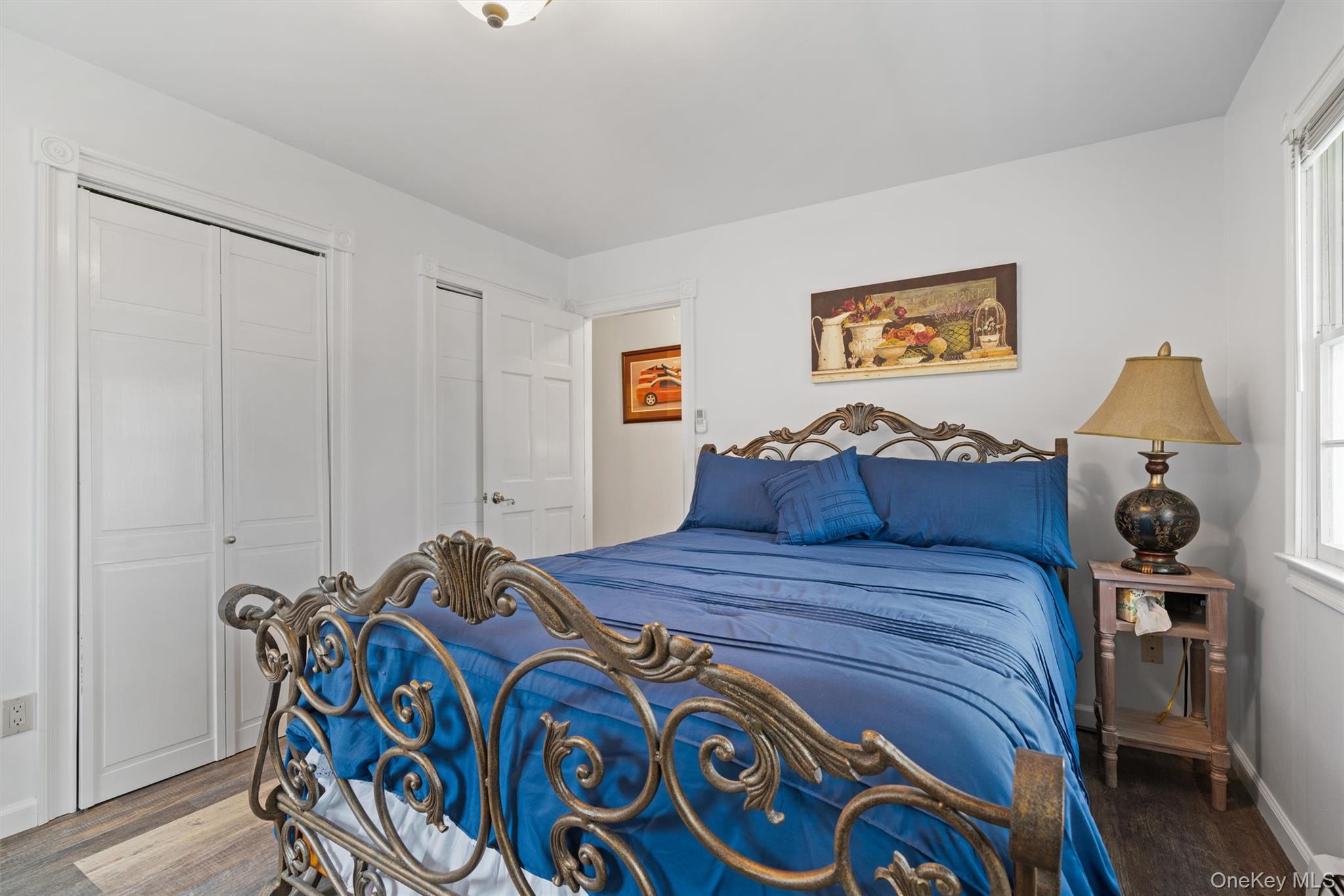 5 Hess Road Callicoon, NY 12723 - Photo 20 of 45 a bed room with a bed and painting on the wall