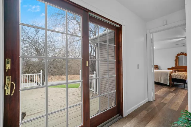 a view of a bedroom from the balcony