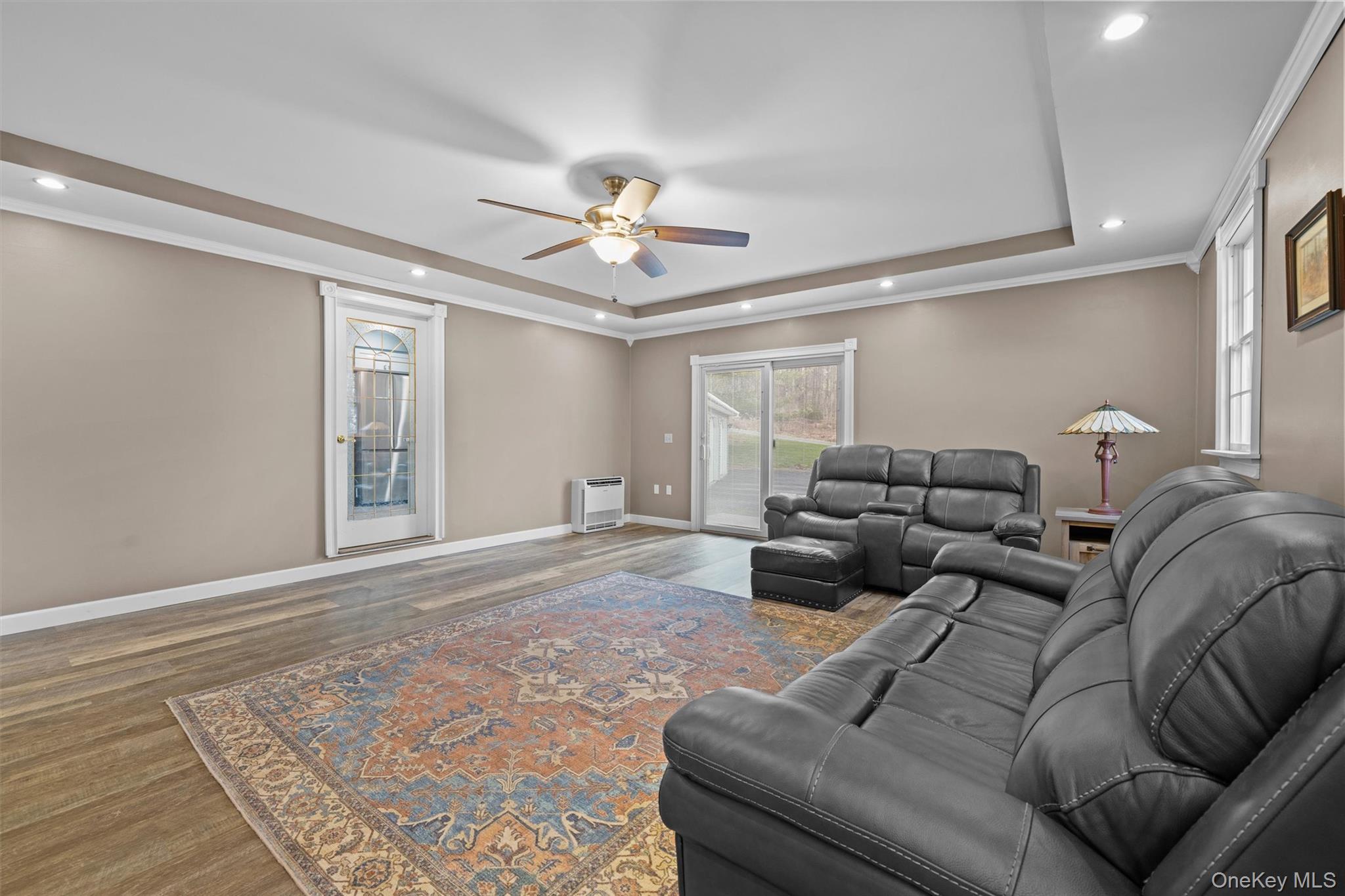 5 Hess Road Callicoon, NY 12723 - Photo 29 of 45 a living room with furniture ceiling fan and a rug