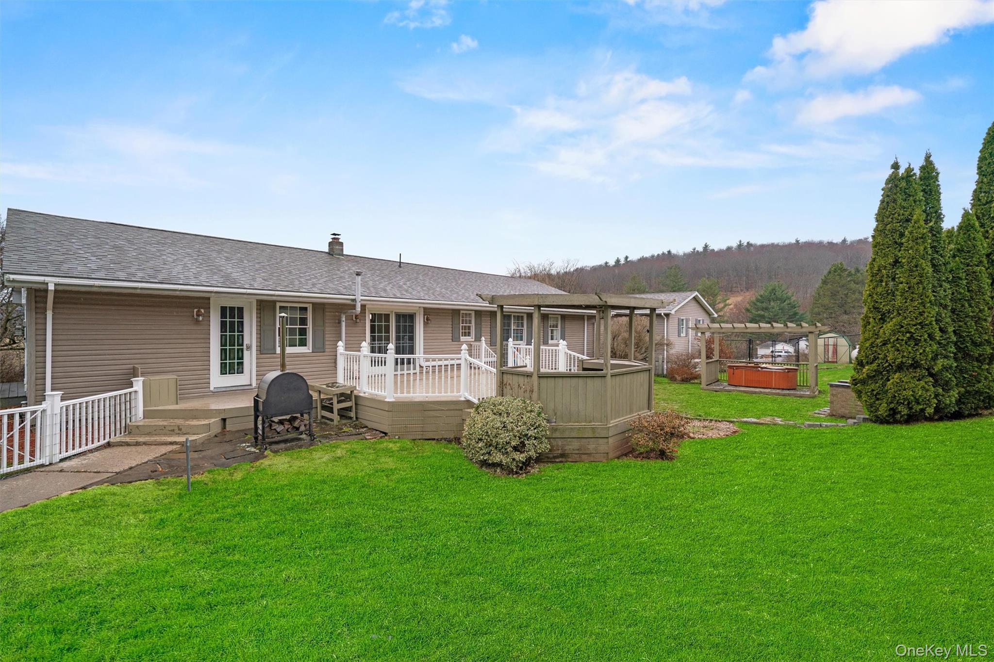 5 Hess Road Callicoon, NY 12723 - Photo 36 of 45 a front view of house with yard and outdoor seating