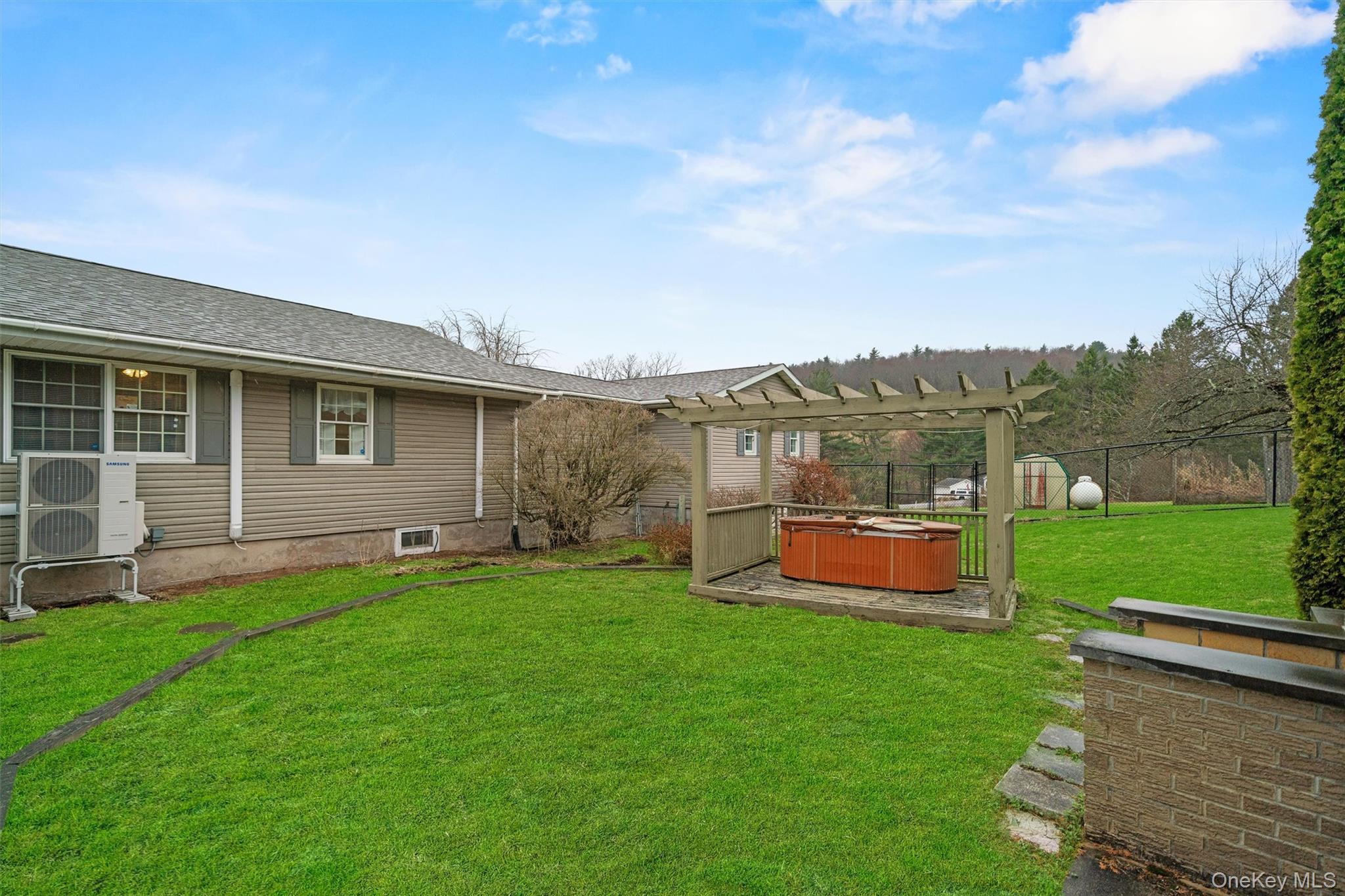 5 Hess Road Callicoon, NY 12723 - Photo 37 of 45 a view of a house with a yard and sitting area
