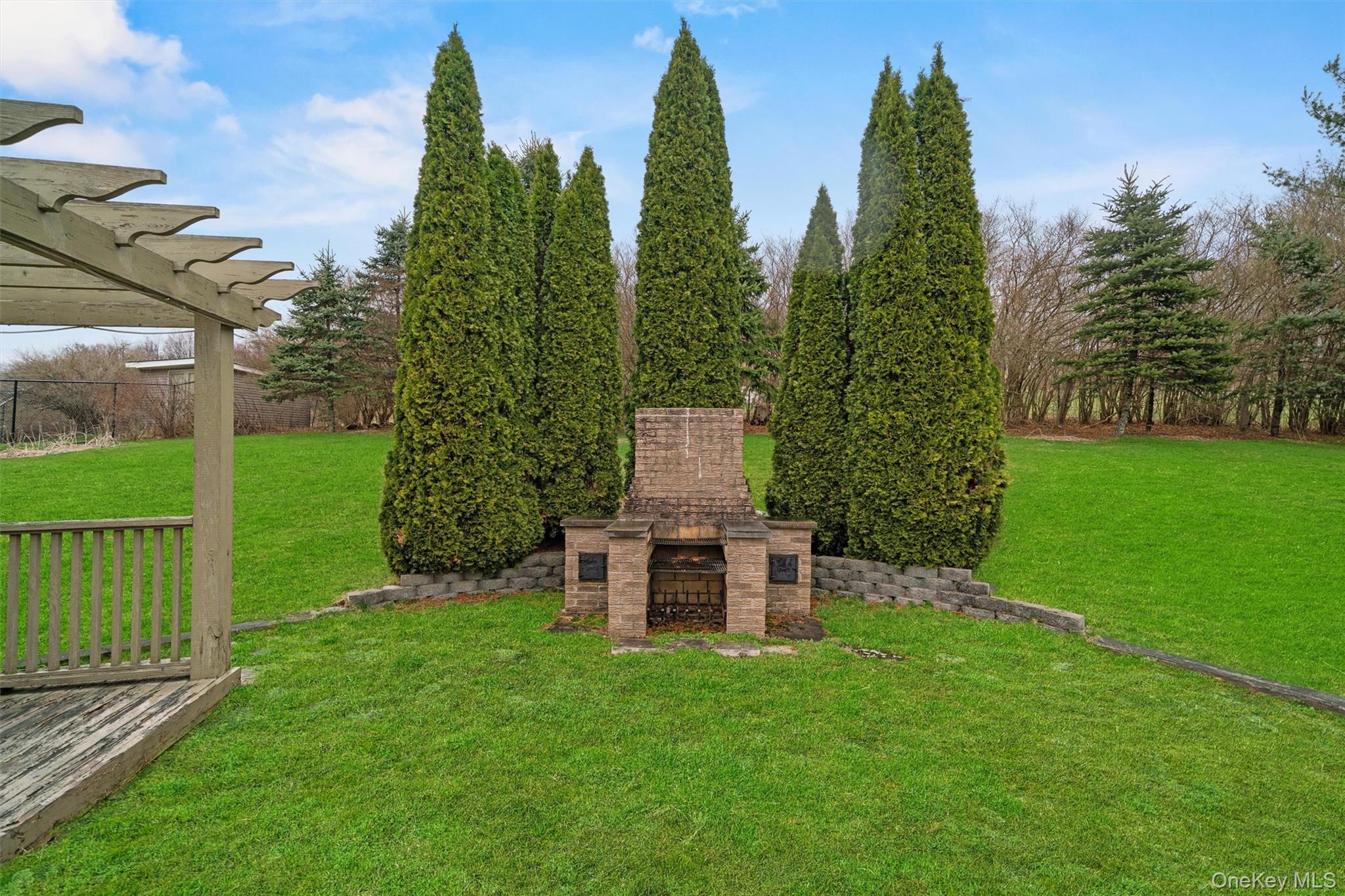 5 Hess Road Callicoon, NY 12723 - Photo 38 of 45 a view of a garden with a bench and trees around