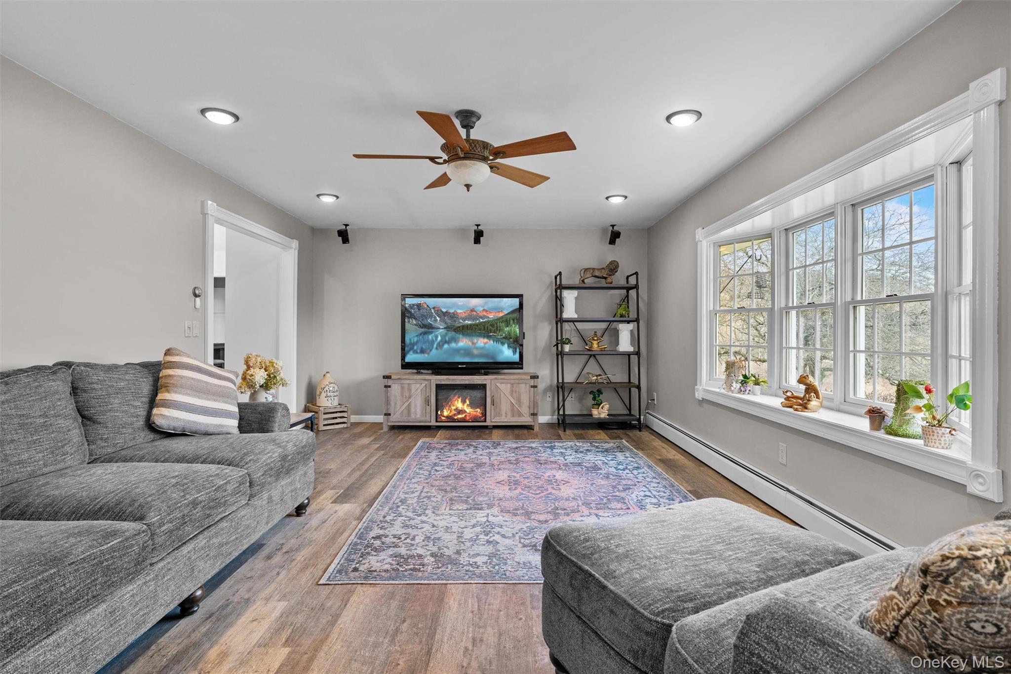 5 Hess Road Callicoon, NY 12723 - Photo 10 of 45 a living room with furniture and a flat screen tv
