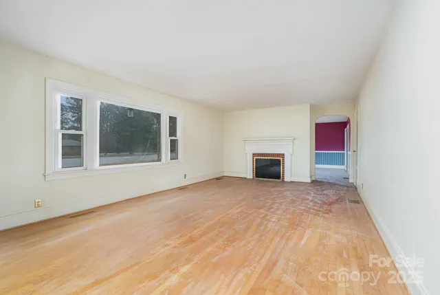 a view of a hallway with windows