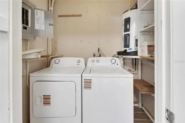 a utility room with dryer and washer
