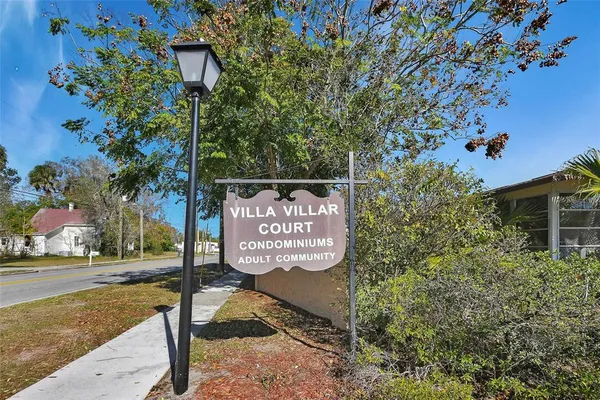 a sign on the side of a road