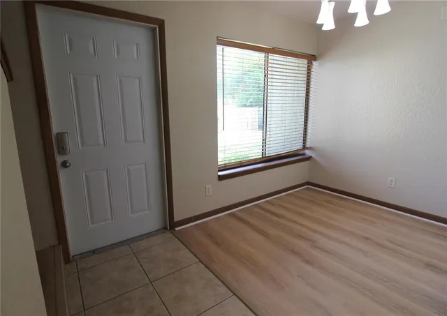 an empty room with windows