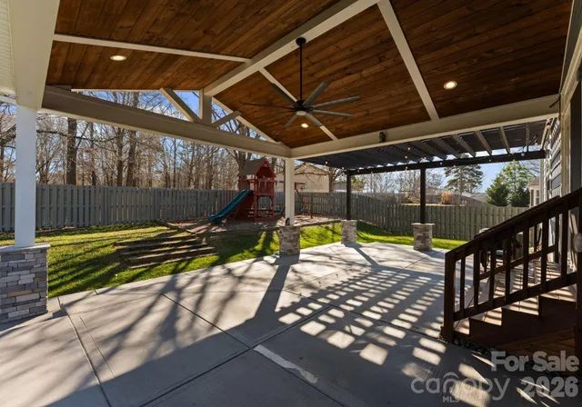 a view of a swimming pool with a porch