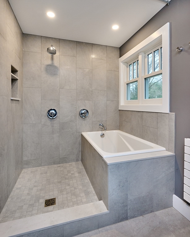27 Heatherstone Road Amherst, MA 01002 - Photo 24 of 42 a bathroom with a bathtub and shower