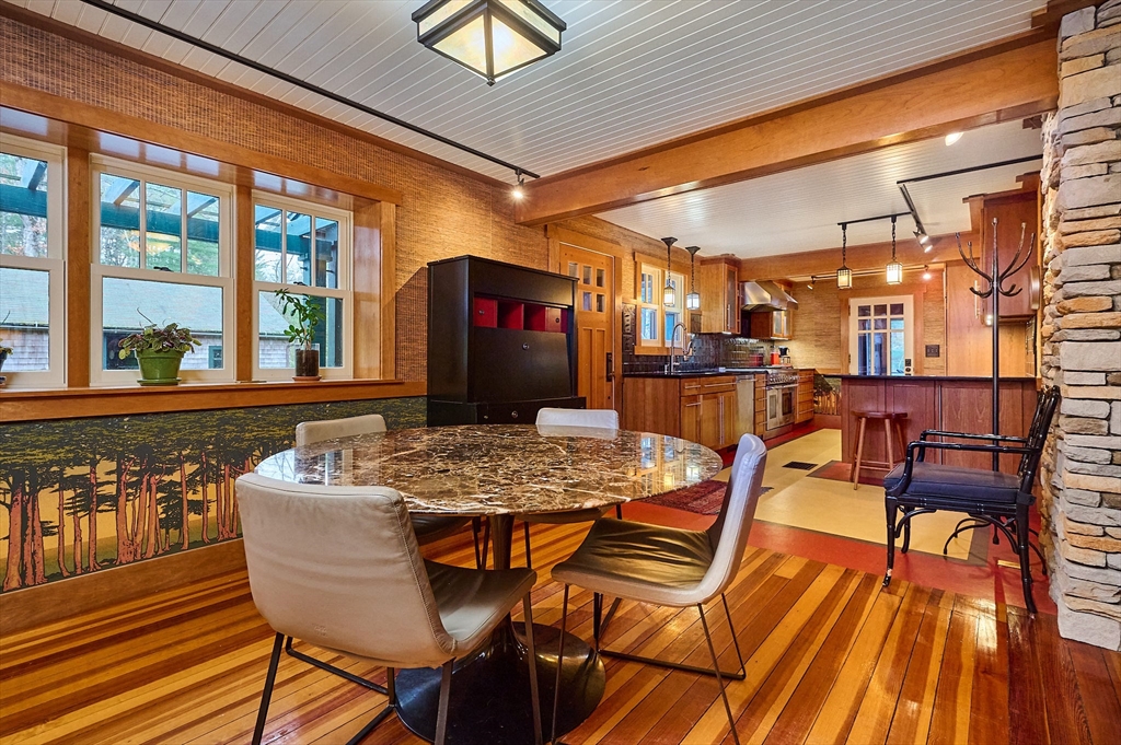 27 Heatherstone Road Amherst, MA 01002 - Photo 4 of 42 a dining room with furniture and wooden floor