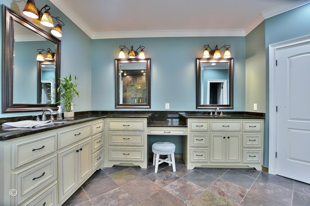 50 Grizzly Court Fortson, GA 31808 - Photo 32 of 59 a bathroom with a granite countertop sink and a mirror