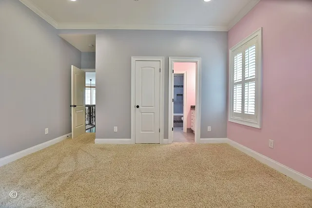 a bathroom with a granite countertop sink a toilet and a mirror