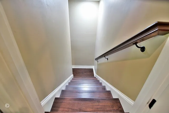 a view of a swimming pool with a yard