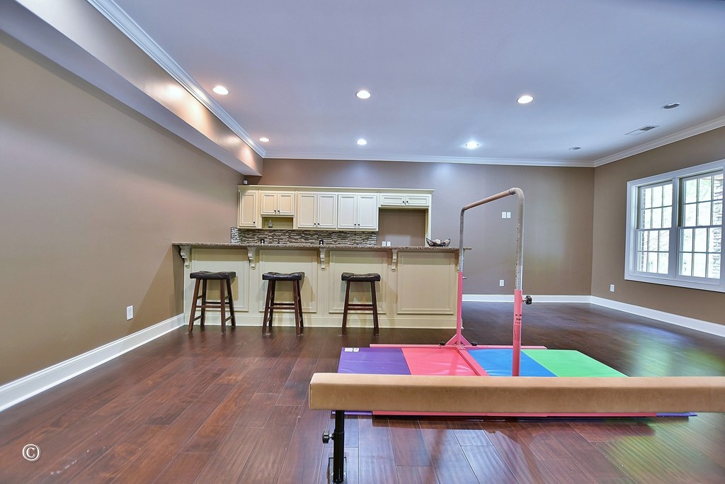 50 Grizzly Court Fortson, GA 31808 - Photo 44 of 59 a view of kitchen with stainless steel appliances furniture and wooden floor