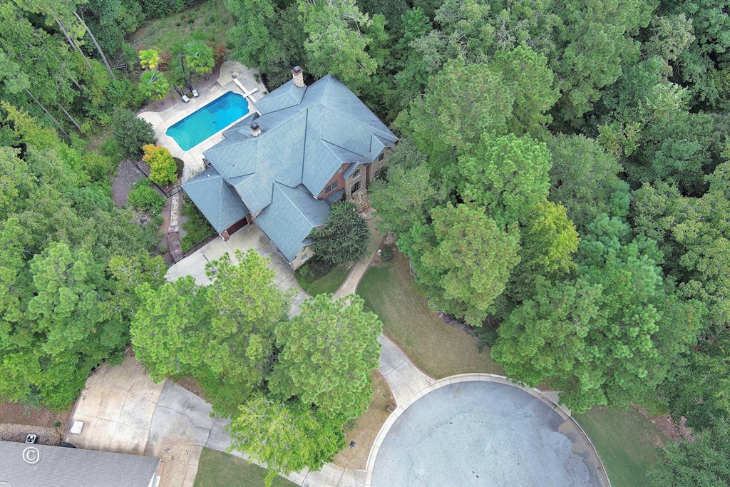 50 Grizzly Court Fortson, GA 31808 - Photo 55 of 59 an aerial view of a house with a yard and trees