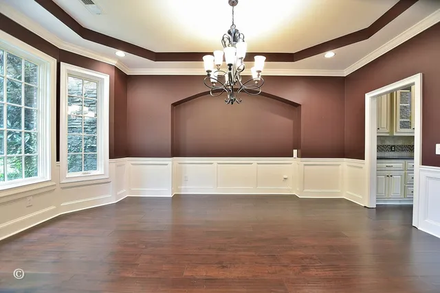 a kitchen with stainless steel appliances granite countertop a stove and a microwave