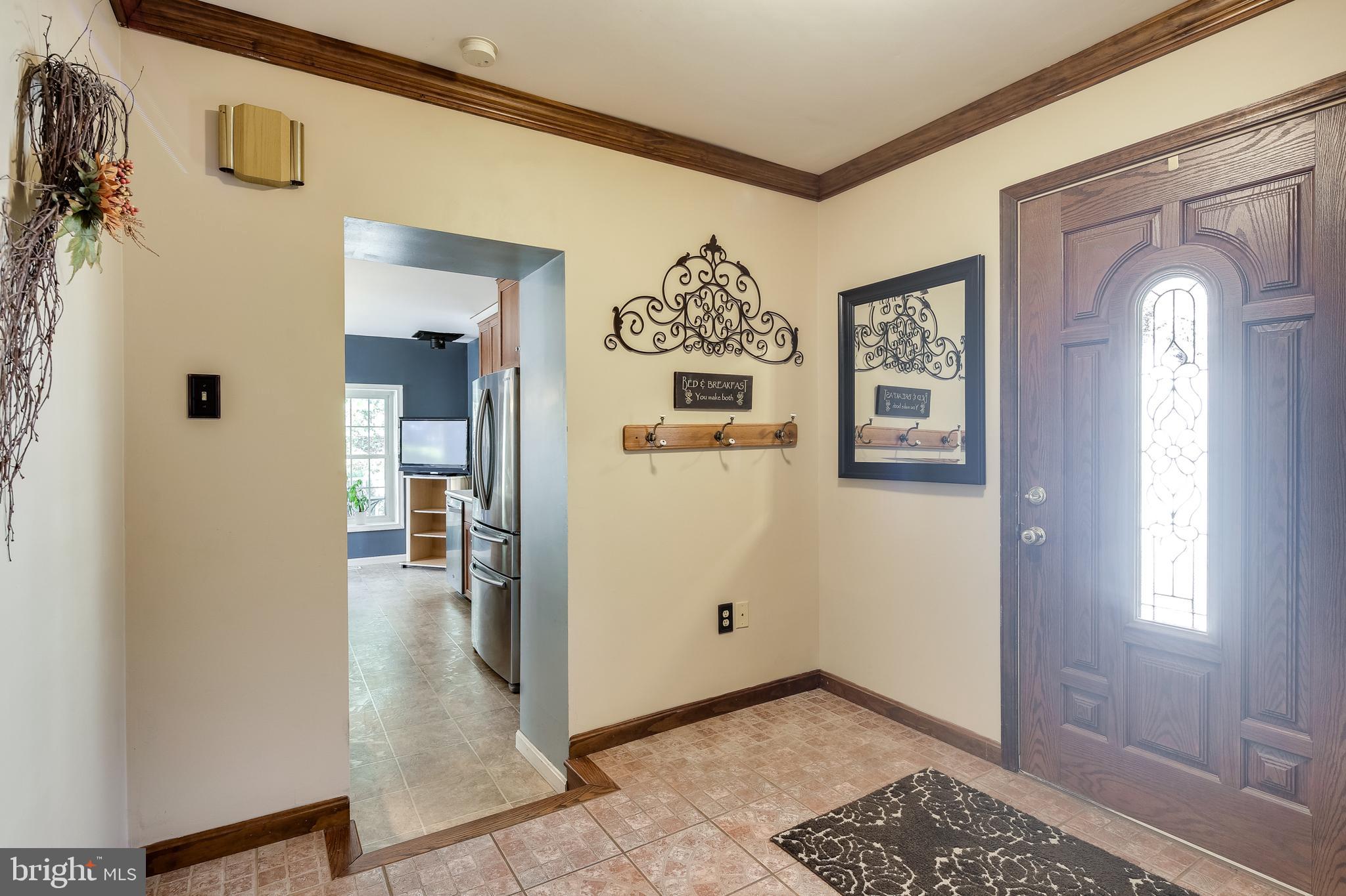21613 Mt Lena Road Boonsboro, MD 21713 - Photo 13 of 39 Large foyer w/wooden door with window.