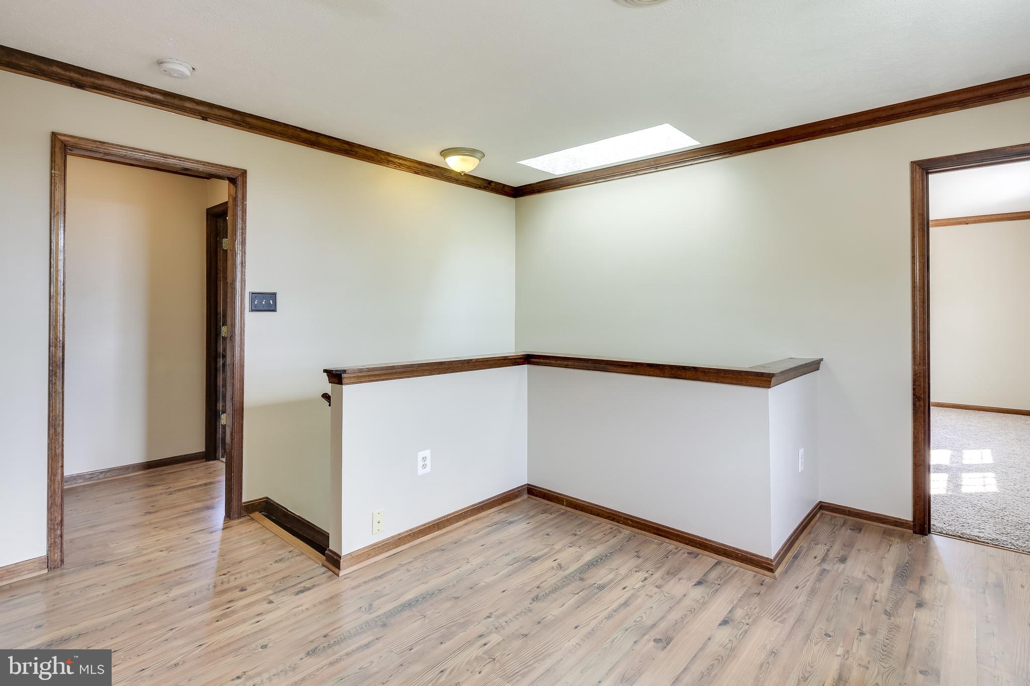 21613 Mt Lena Road Boonsboro, MD 21713 - Photo 23 of 39 Reading room loft area with skylight.