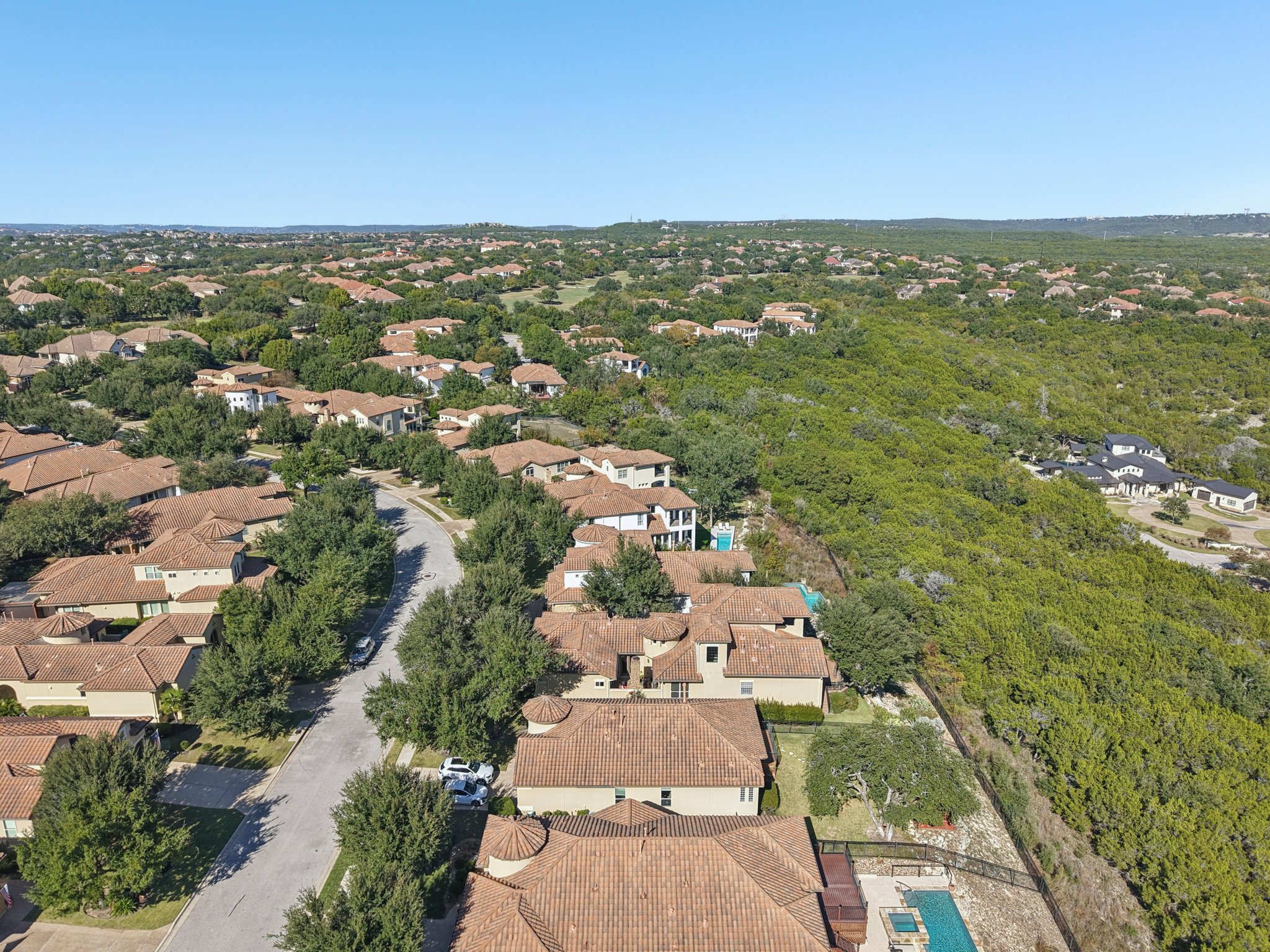 11613 Shadestone Terrace Austin, TX 78732 - Photo 28 of 35 an aerial view of residential houses with outdoor space