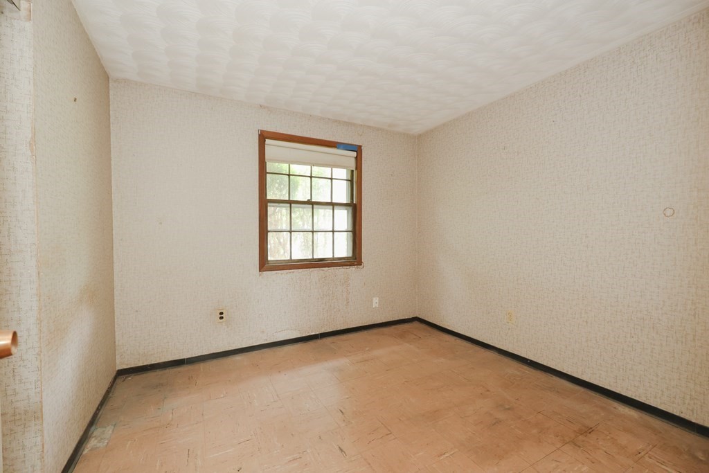 27 Trinity Street Danvers, MA 01923 - Photo 17 of 19 an empty room with a window