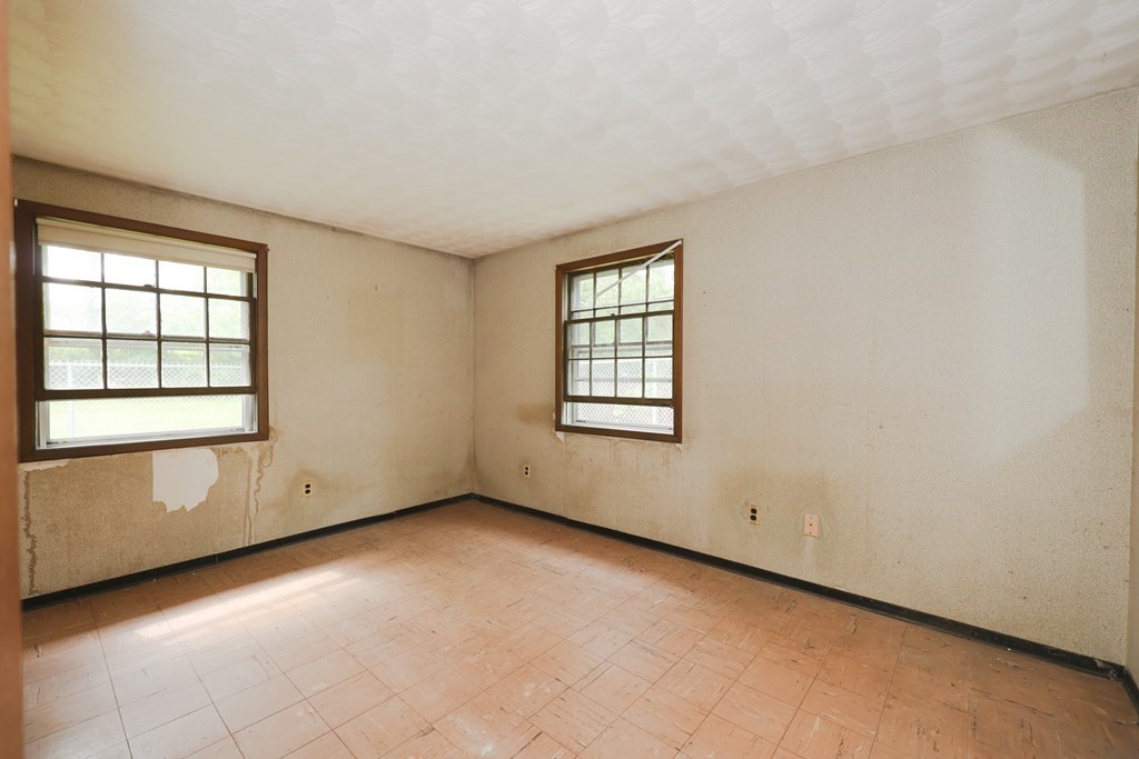 27 Trinity Street Danvers, MA 01923 - Photo 19 of 19 an empty room with windows