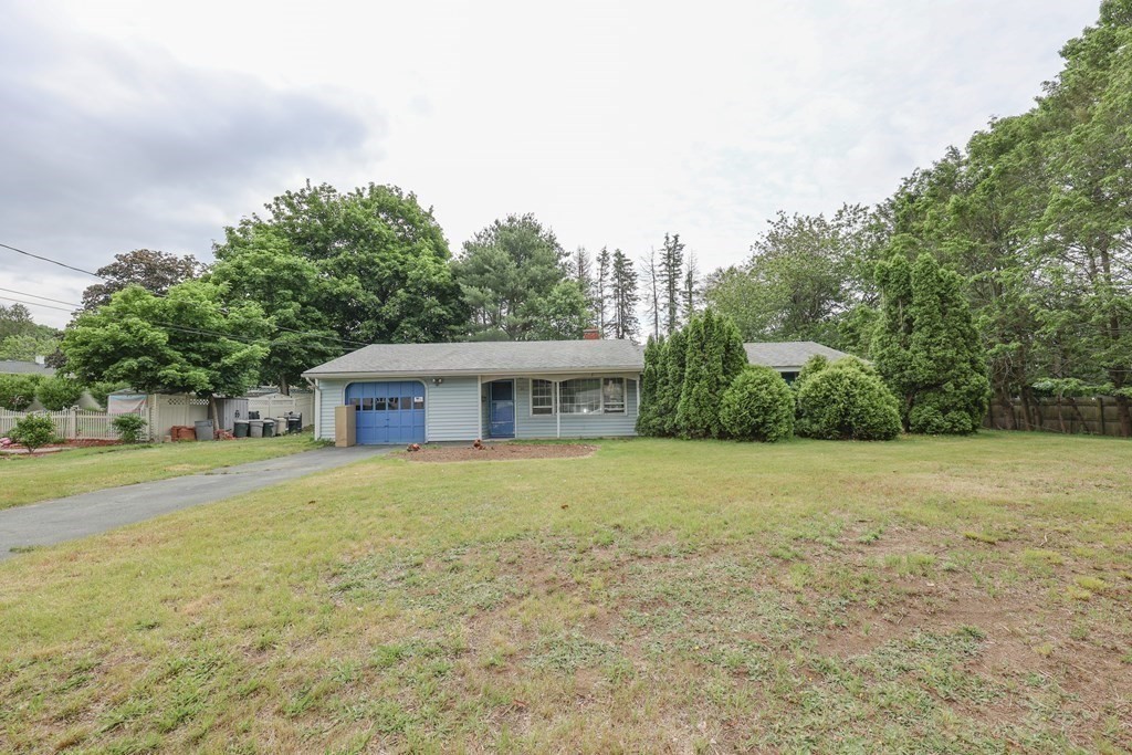 27 Trinity Street Danvers, MA 01923 - Photo 6 of 19 a view of a house with a yard and basketball court