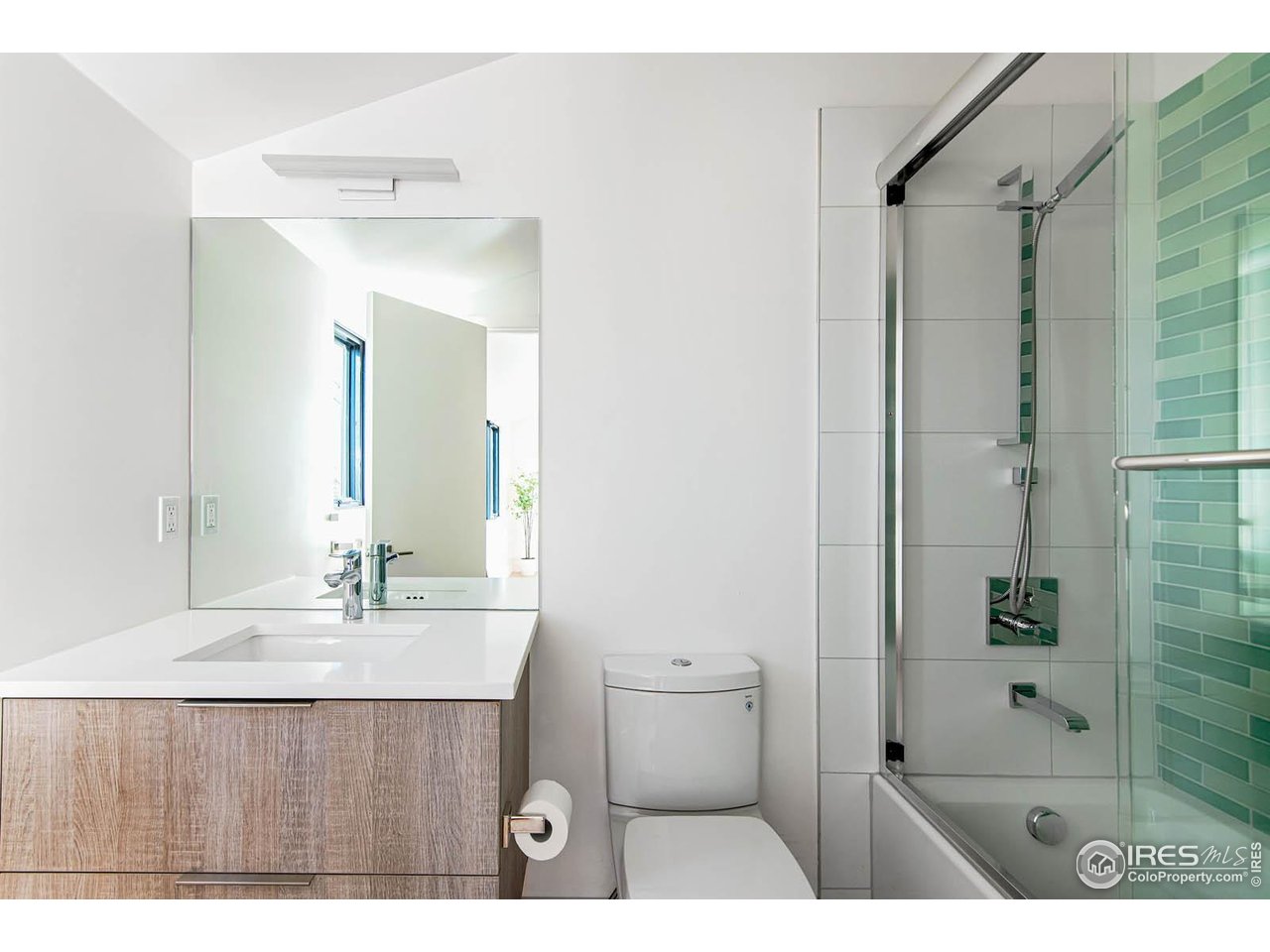 210 Cactus Court Boulder, CO 80304 - Photo 39 of 50 a bathroom with a sink and a mirror